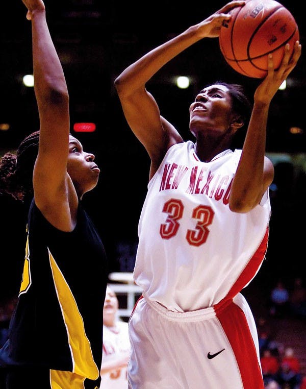 UNM forward Dionne Marsh shoots a layup during Saturday's 76-63 win against Towson University at The Pit.