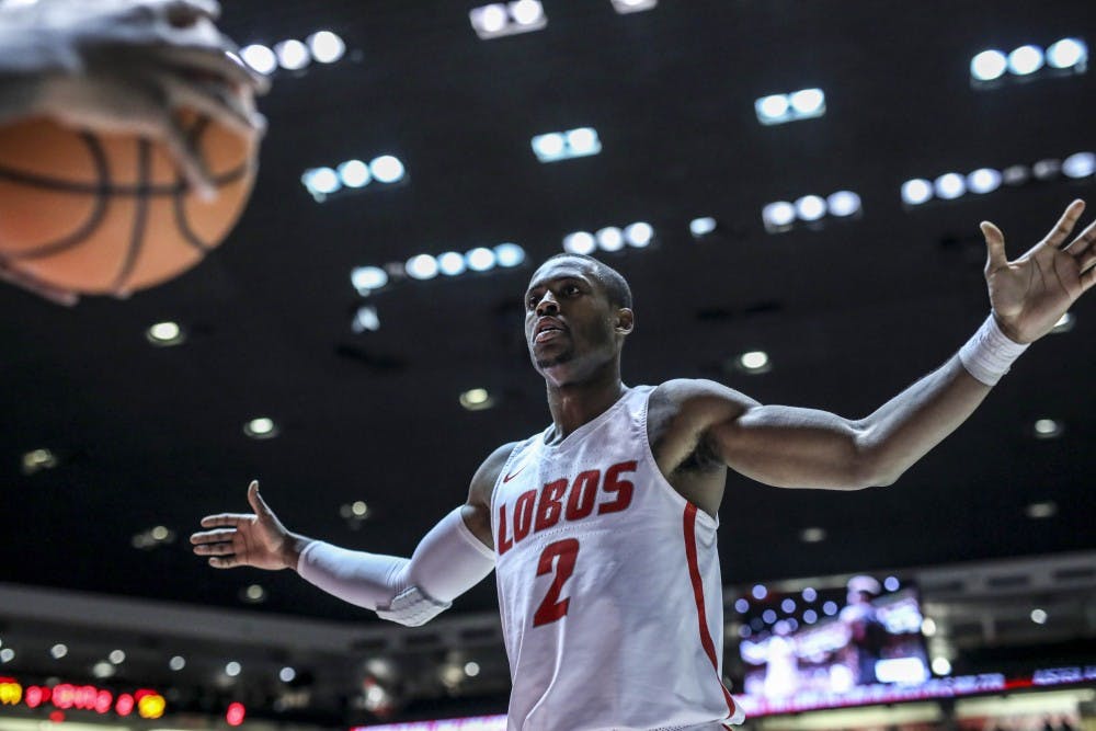 Senior Sam Logwood defends the basket from the Northern New Mexico Eagles during a home game at Dreamstyle Arena on Nov. 11, 2017. The Lobos ran an imposing full court press for the majority of the game. 