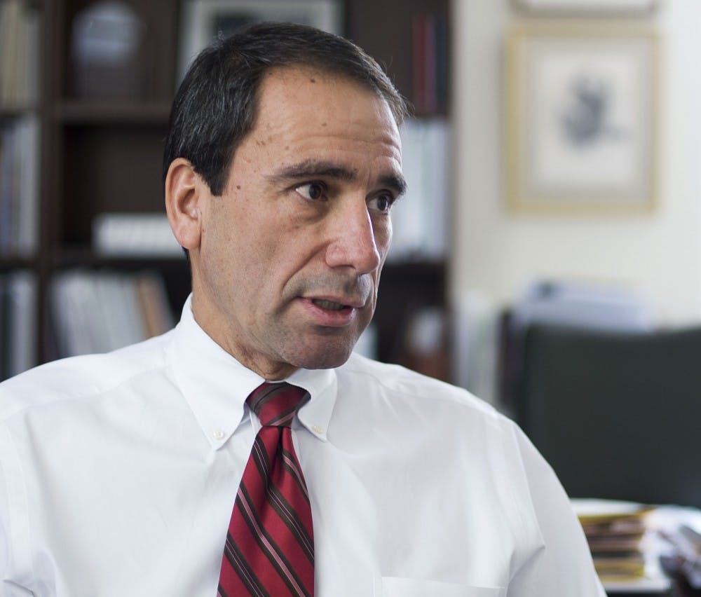 	In his office in Scholes Hall on Wednesday, Patrick Apodaca discusses his time as University counsel at UNM. Apodaca is leaving UNM for a senior legal and executive position at PNM, New Mexico’s largest electricity provider.