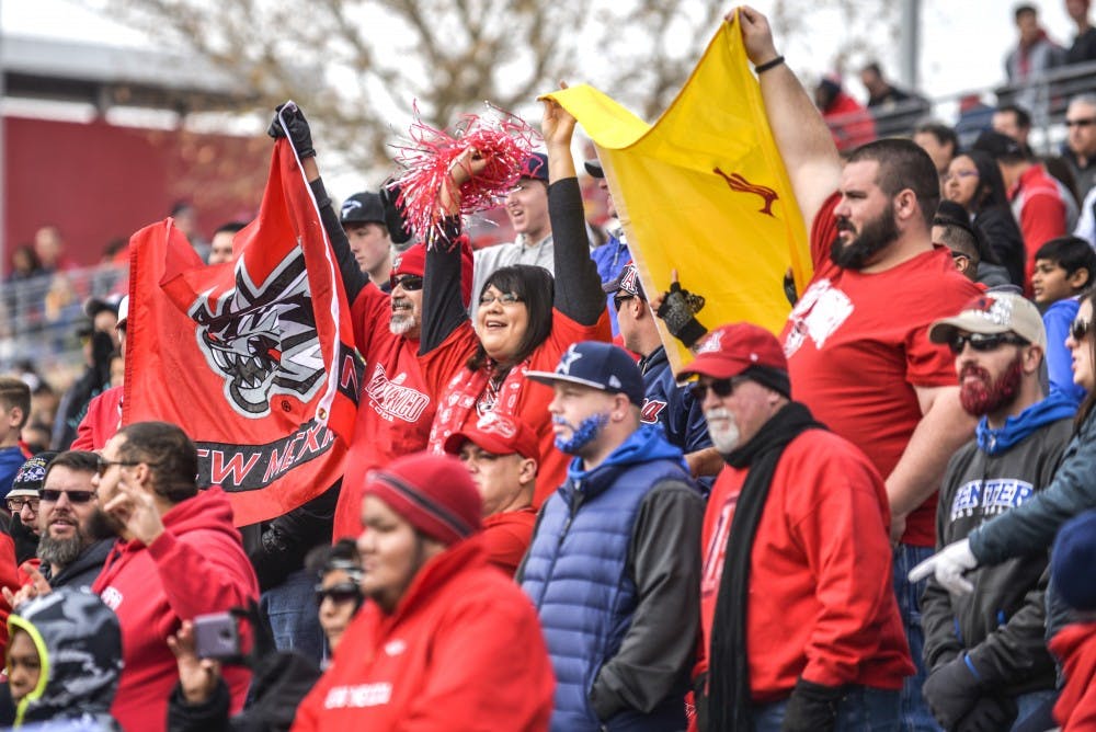 Football fans cheer during the 10th Gildan New Mexico Bowl Saturday December 19, 2015 at University Stadium. During the upcoming season, Lobo football fans will have the opportunity to win prizes during giveaways, as well as be able to come down to the field after games for photos.