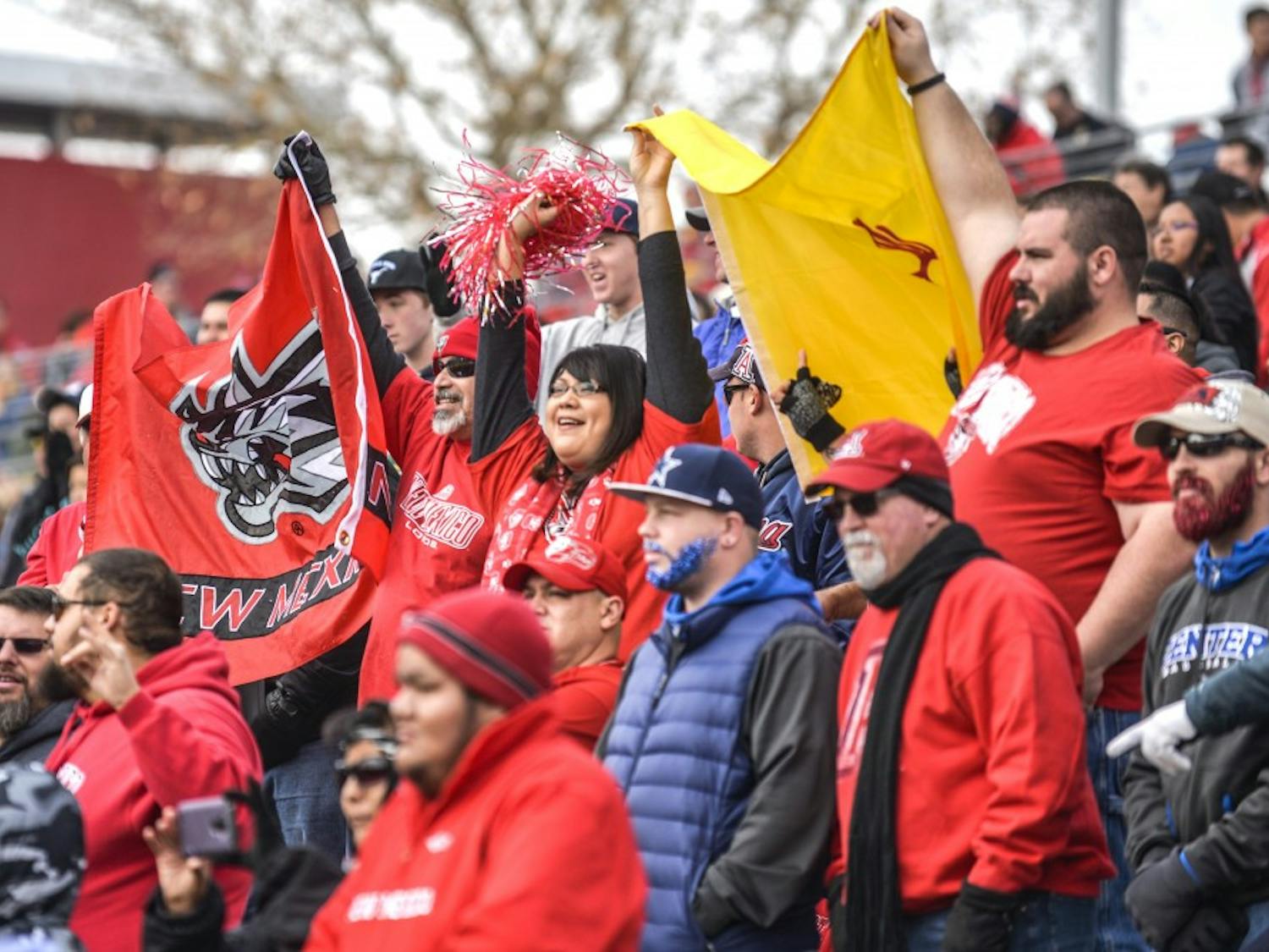 Football fans cheer during the 10th Gildan New Mexico Bowl Saturday December 19, 2015 at University Stadium. During the upcoming season, Lobo football fans will have the opportunity to win prizes during giveaways, as well as be able to come down to the field after games for photos.