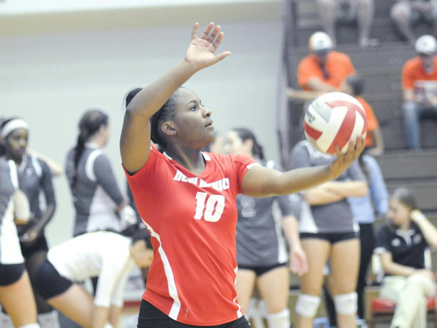 New Mexico volleyball defensive specialist Taylor Cross prepare to serve the ball during a match last Saturday. The Lobos faced off against Hawaii late Thursday night to jump start the Hawaiian Airlines Wahine Volleyball Classic at the Stan Sheriff Center.