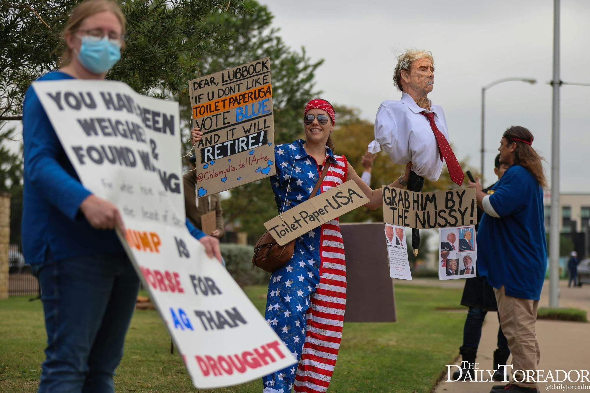 Democrats protest at the Donald Trump and Ken Paxton Midterm rally at the Lubbock Memorial Civic Center Oct. 27, 2026