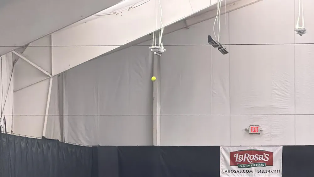 Freshman Allie Faulkner prepares to serve in a singles match