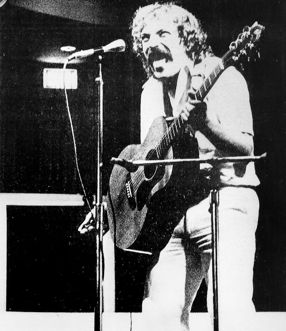 Mime artist Tim Settimi hams it up in front of a standing-room-only crowd Tuesday at the Shriver Center.