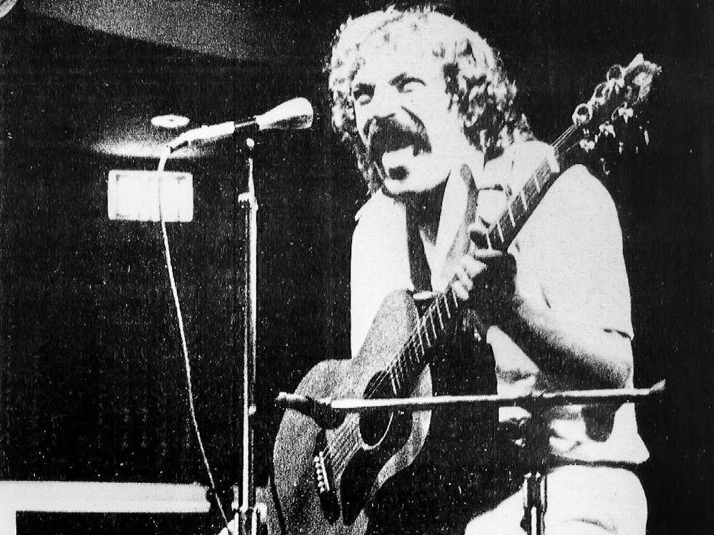Mime artist Tim Settimi hams it up in front of a standing-room-only crowd Tuesday at the Shriver Center.