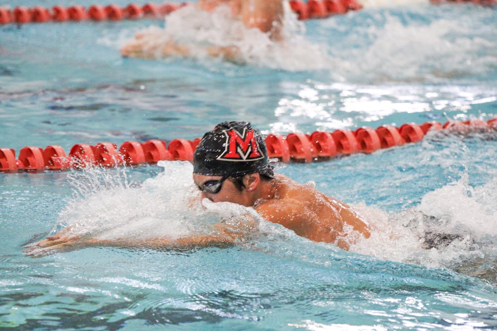 <p>Miami men’s swimming and diving team earned their fourth consecutive MAC title. Photo provided by Lexie Cunningham</p>