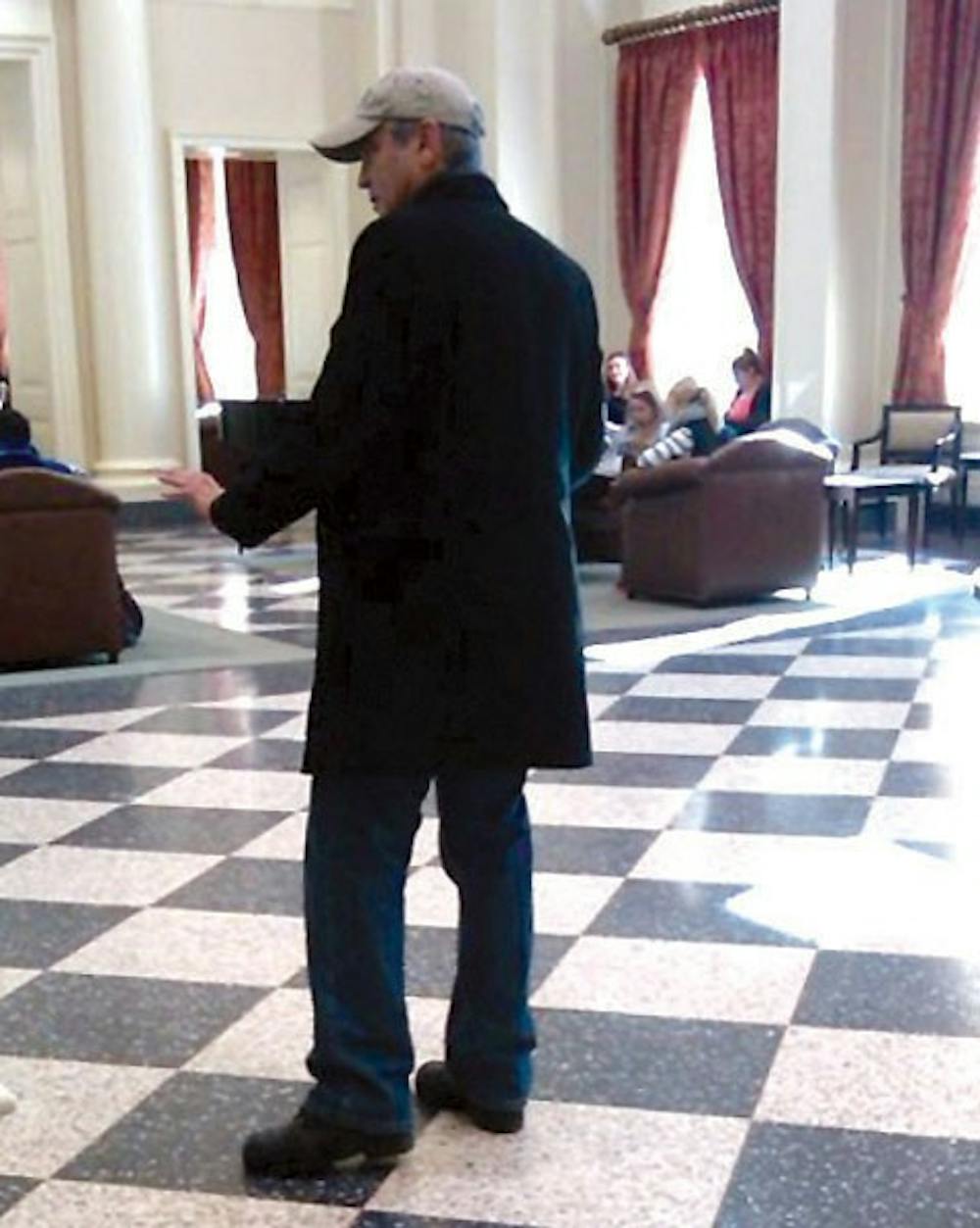 George Clooney stands in the lobby of the Farmer School of Business on Feb. 2 to scout locations for his upcoming movie.