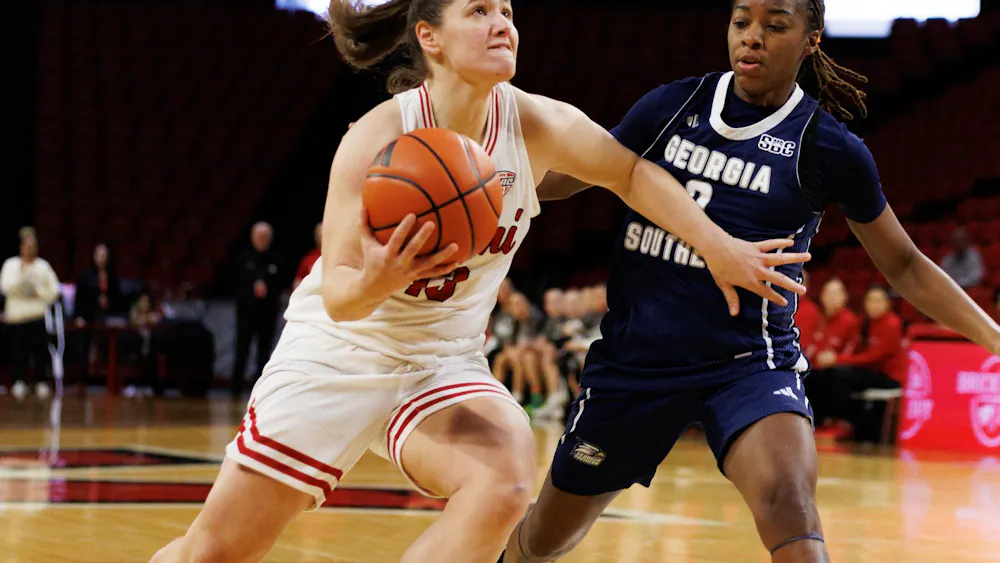 Sophomore guard Tamar Singer drives to the basket against Georgia Southern University on Feb. 7