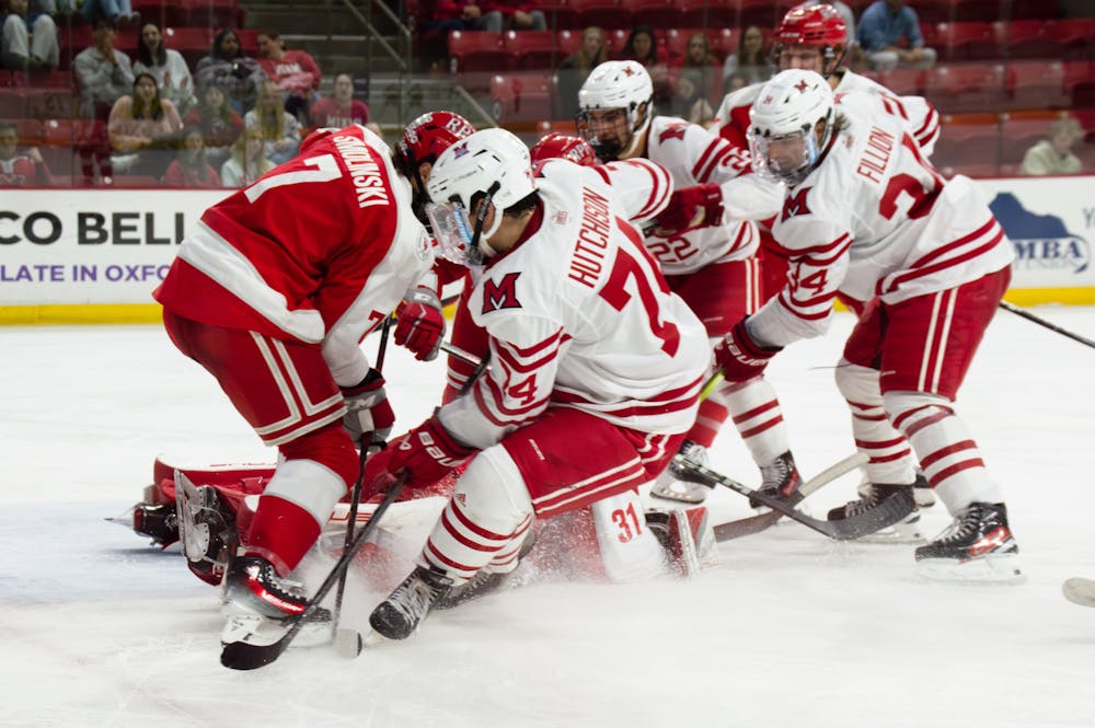 Connor Hutchison skates against the RPI Engineers at Goggin Ice Center