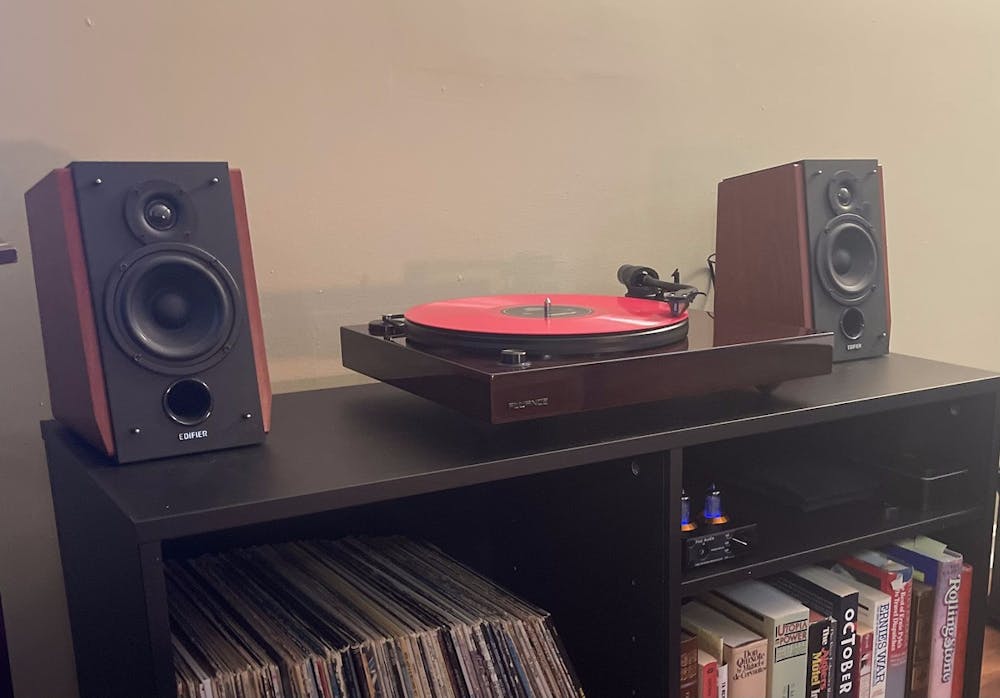 Asst. Opinion Editor Devin Ankeney can now bolster their vinyl setup (pictured above) with new local shop Black Plastic Oxford.