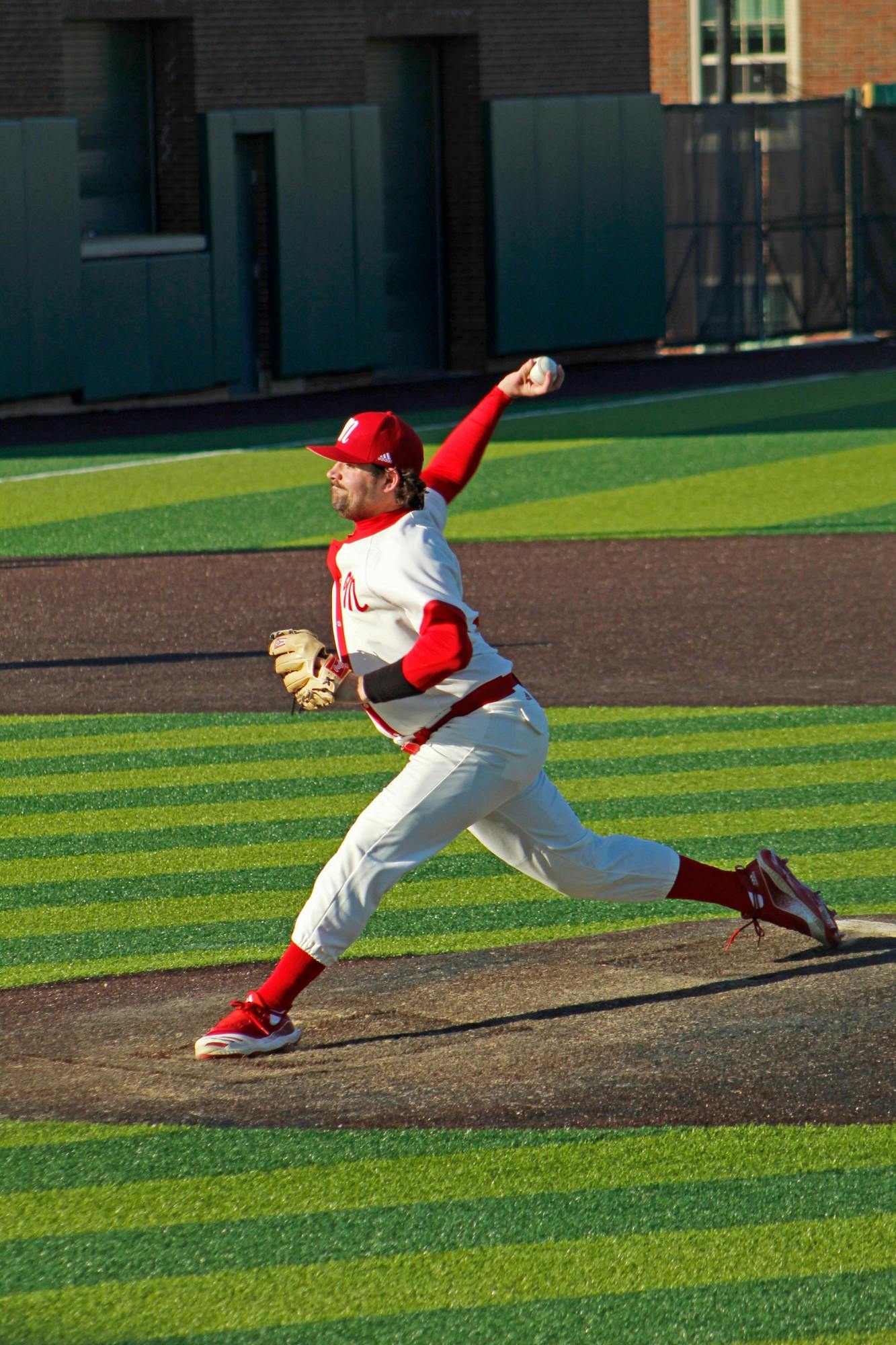 A Miami hurler delivers a pitch at Hayden Park