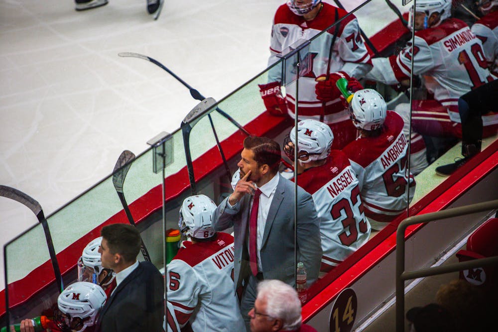 <p>Anthony Noreen stands behind the RedHawks bench at Goggin Ice Center﻿ in his first season. He arrived at Miami following a stint with the Tri-City Storm in the United States Hockey League.</p>