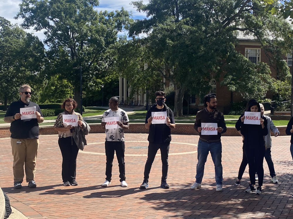 Supporters held signs that said "Mahsa," the name of a woman who died in police custody in Iran.
