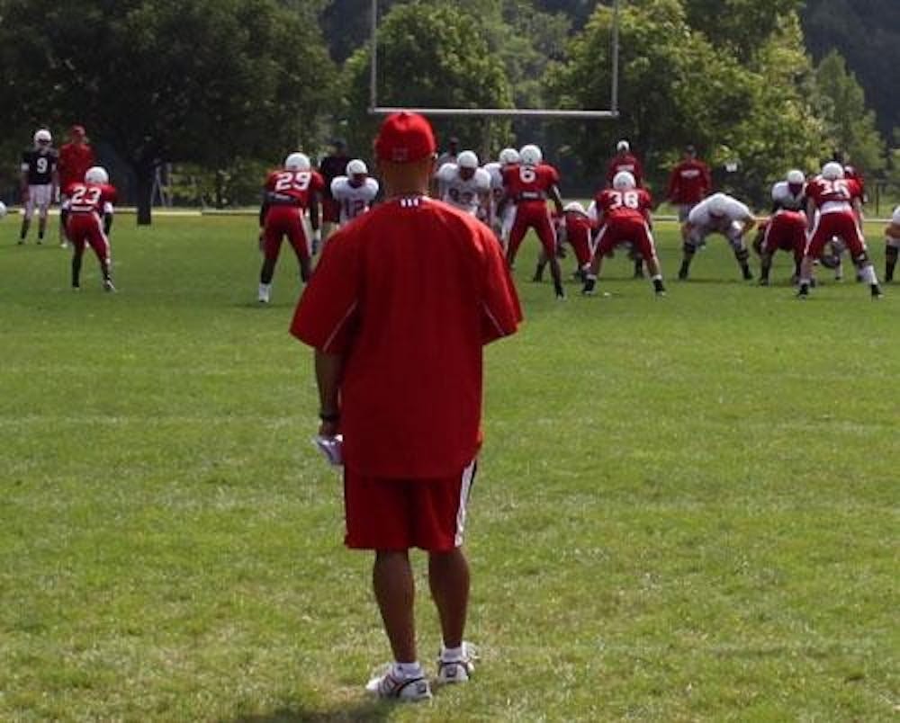 Head football coach Don Treadwell observes his team during summer practice. Treadwell and the RedHawks are seeking their first win of the season Saturday and their first non-conference road game victory since 2005. 