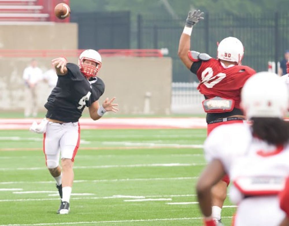 Quarterback Zac Dysert rockets a pass during practice on August 18. 
