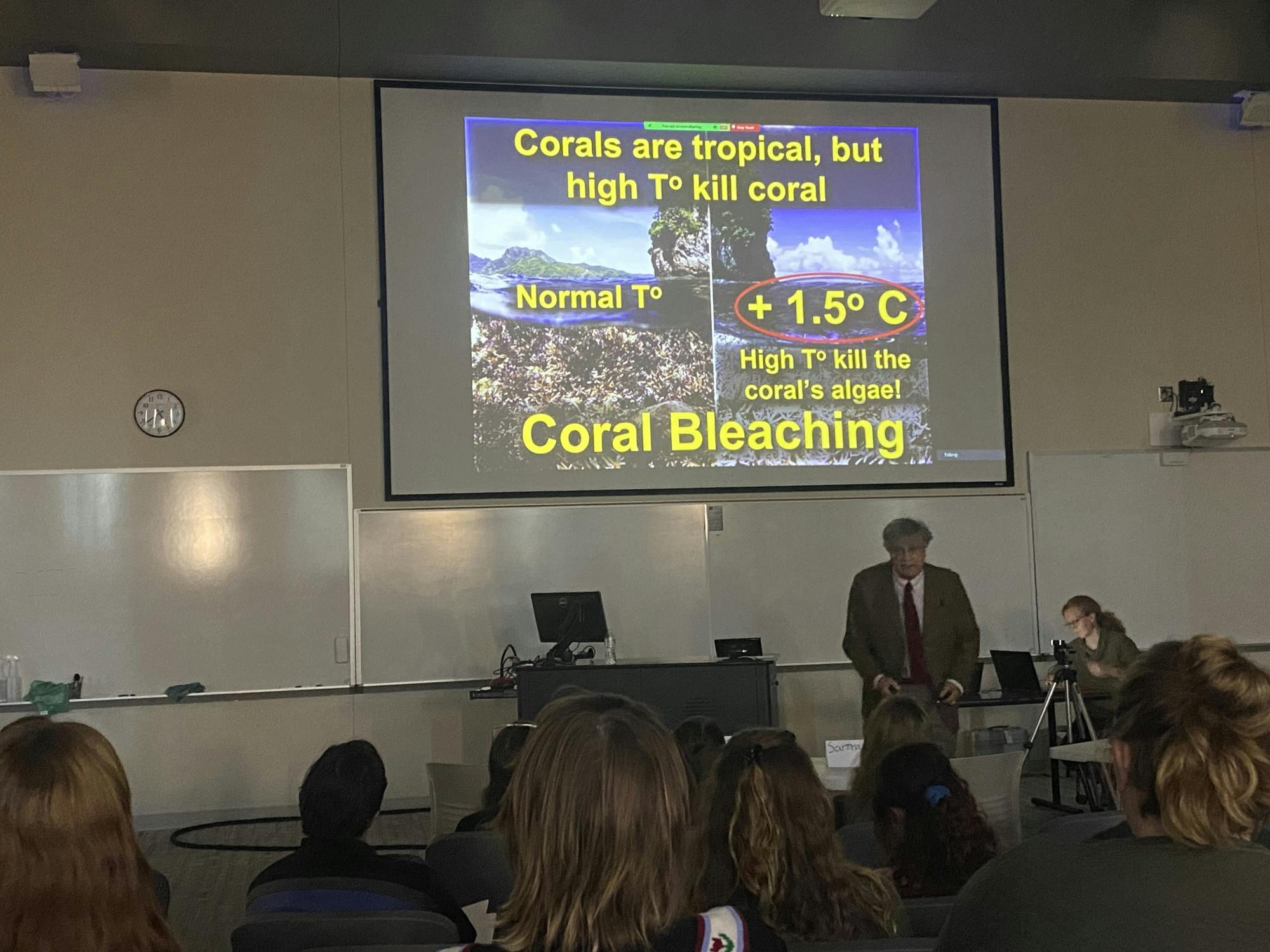 James Porter re-enacting his testimony on coral conservation and human well-being before an audience of Miami students and staff.