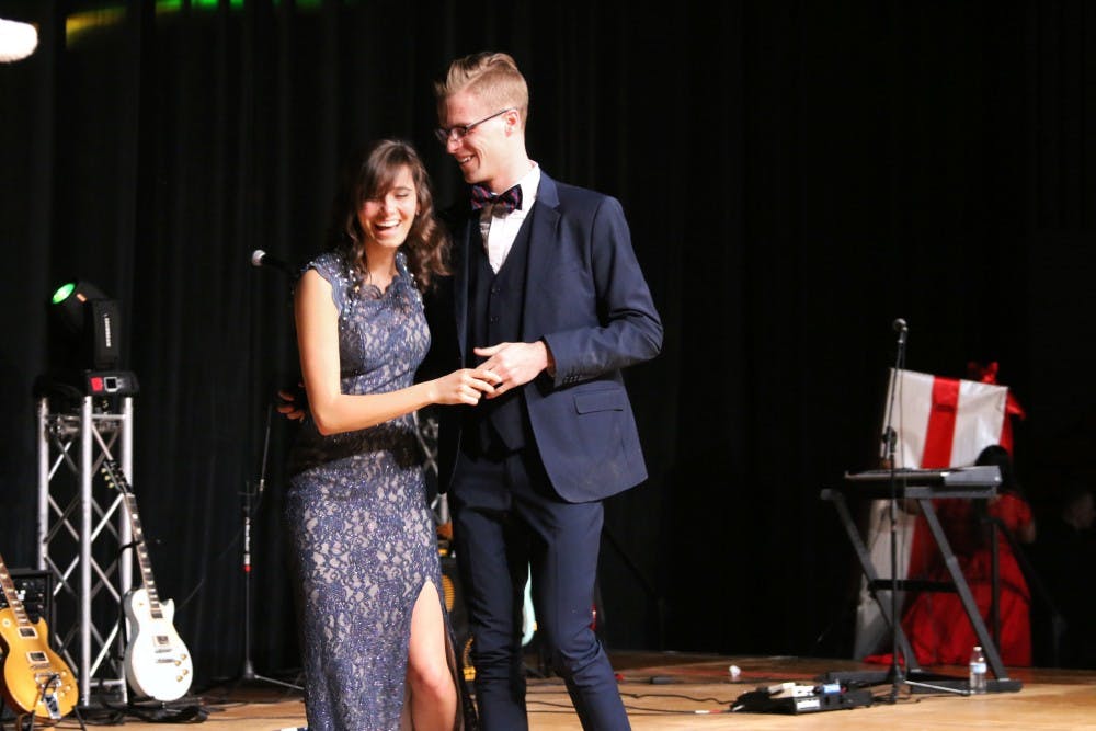 Seniors Jordan Rice (Right) and Taylor Tinnin (Left) get engaged at Saturday’s Charter Day Ball.  