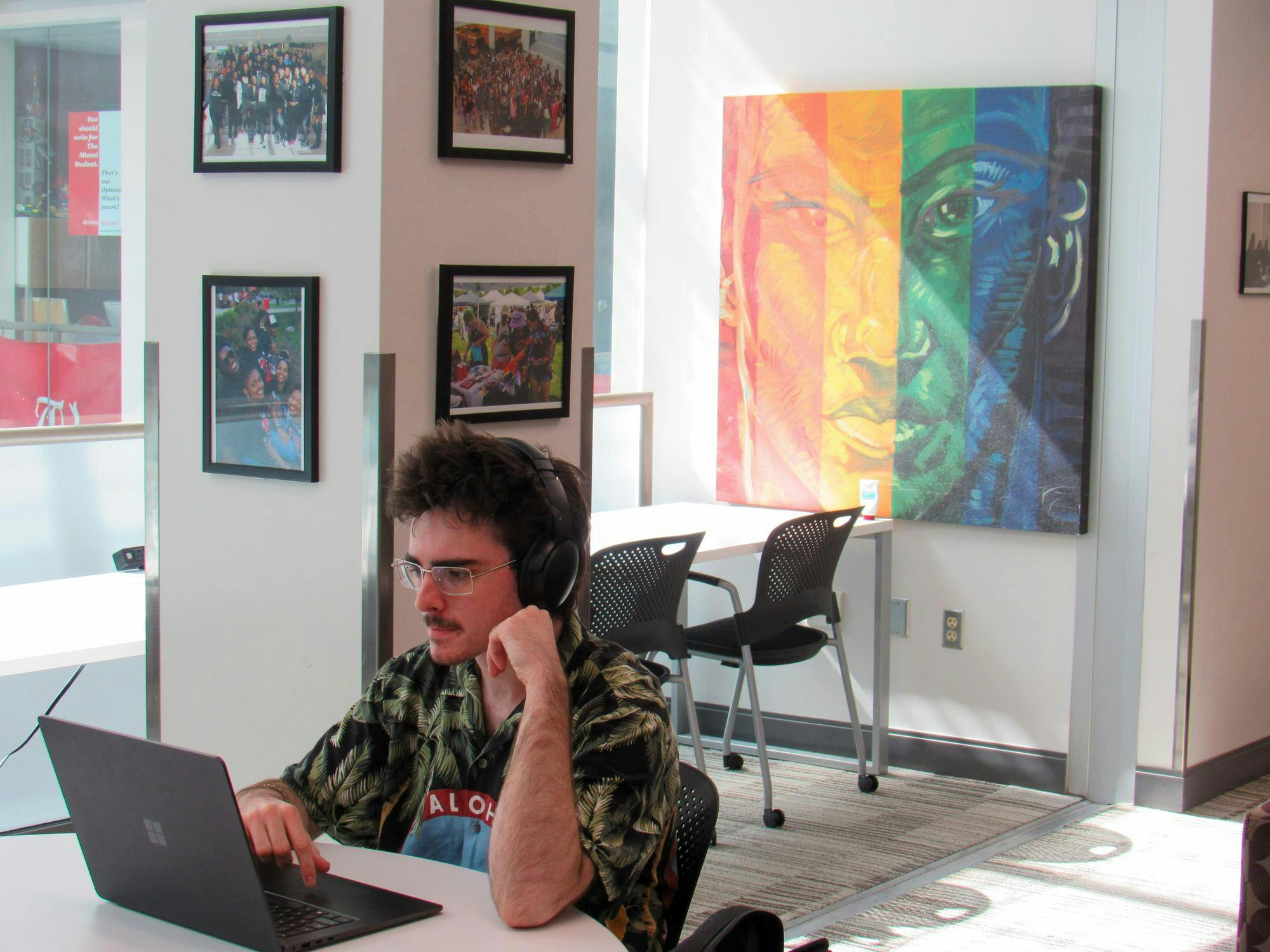 A student works at a computer in the Armstrong Student Center.