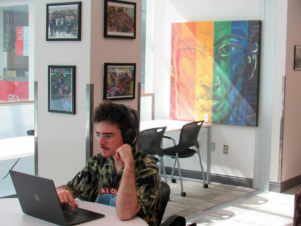 A student works at a computer in the Armstrong Student Center.