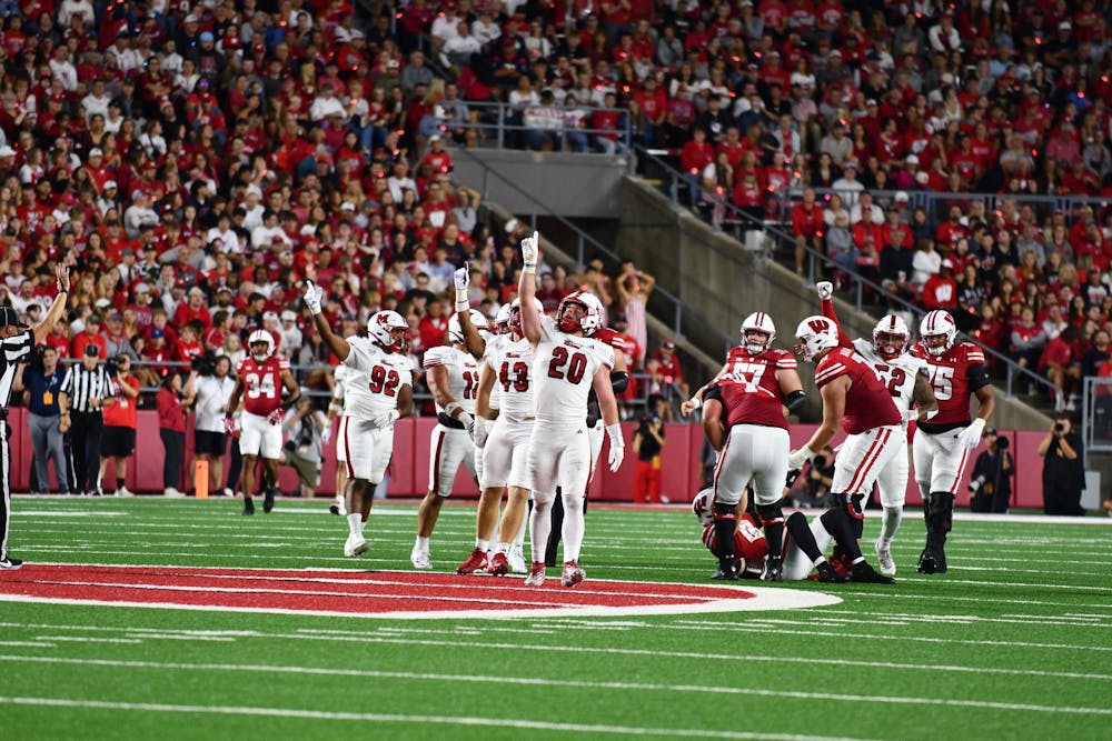 Redshirt junior defensive lineman Adam Trick celebrates his first sack against Wisconsin at Camp Randall Stadium on Aug. 28.