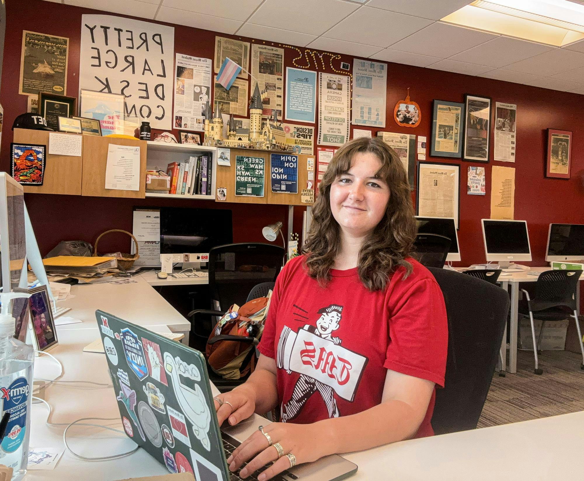 Shannon Mahoney sits at her desk in The Miami Student newsroom in Armstrong Student Center. Photo provided by Shannon Mahoney