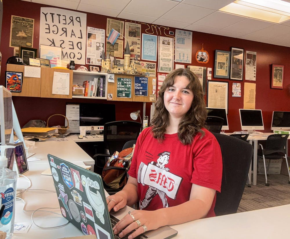 Shannon Mahoney sits at her desk in The Miami Student newsroom in Armstrong Student Center. Photo provided by Shannon Mahoney