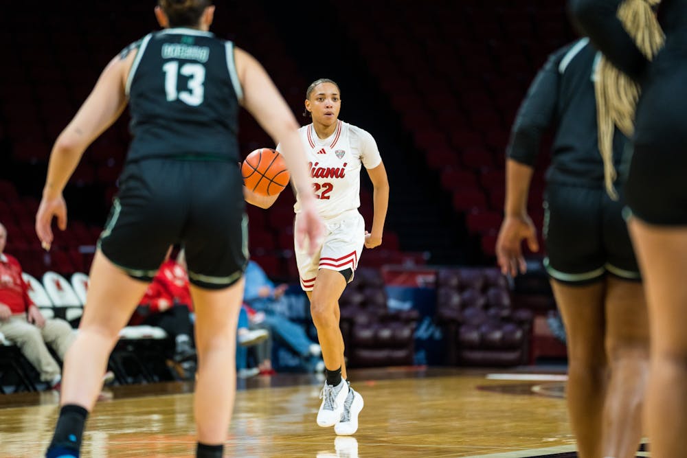 Senior guard Cori Lard dribbling against Eastern Michigan at Millett Hall on Feb. 5