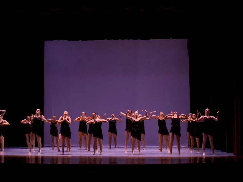 Vision Dance company preforming in Alumni Hall during their annual showcase titled, V2K.