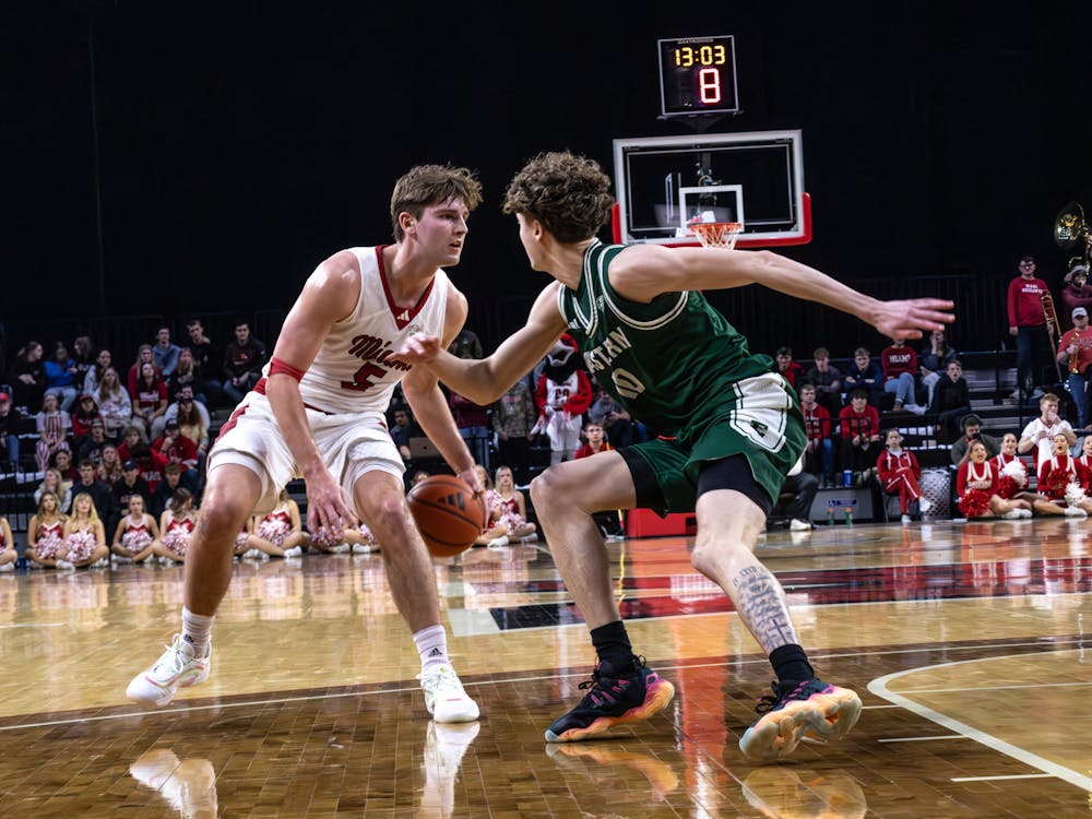 Peter Suder dribbling against Dillion Tingler in the first matchup between Miami and Eastern Michigan on Jan. 28 at Millett Hall
