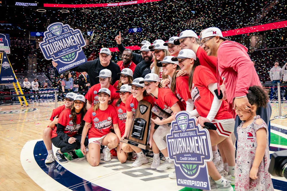 <p>The Miami women's basketball team celebrates its MAC championship victory in Cleveland at Rocket Mortgage Arena on March 14</p>