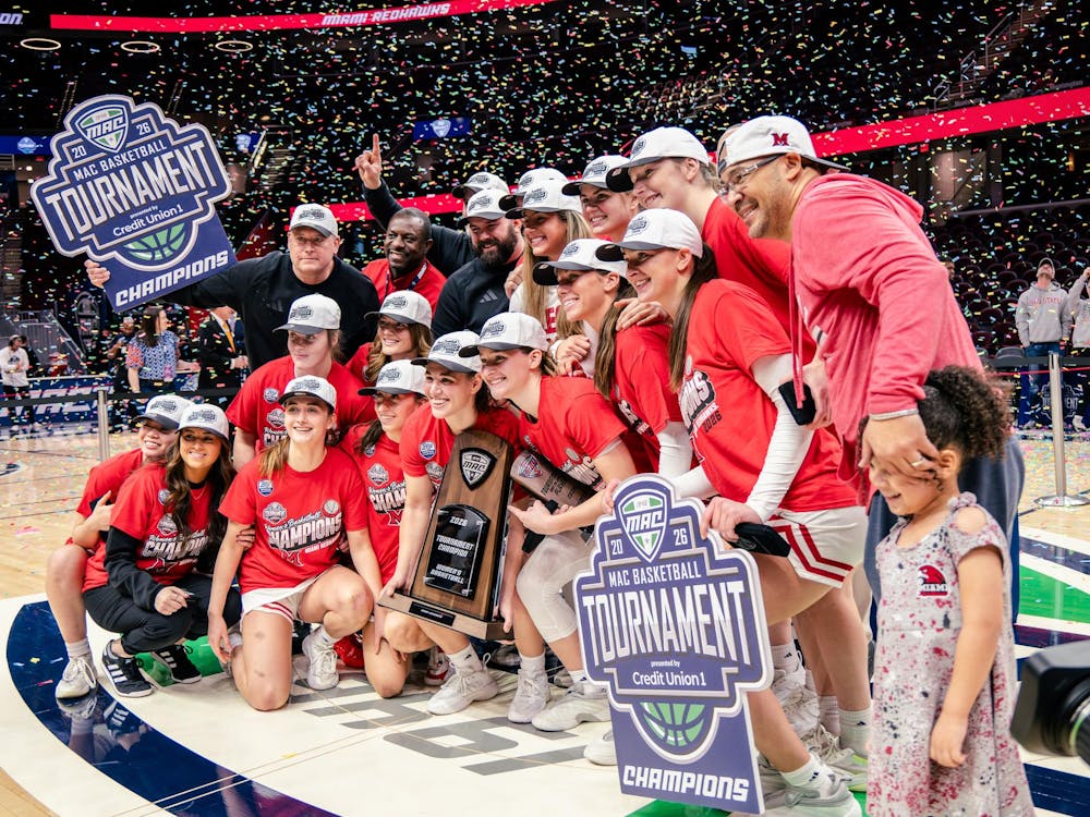 The Miami women's basketball team celebrates its MAC championship victory in Cleveland at Rocket Mortgage Arena on March 14