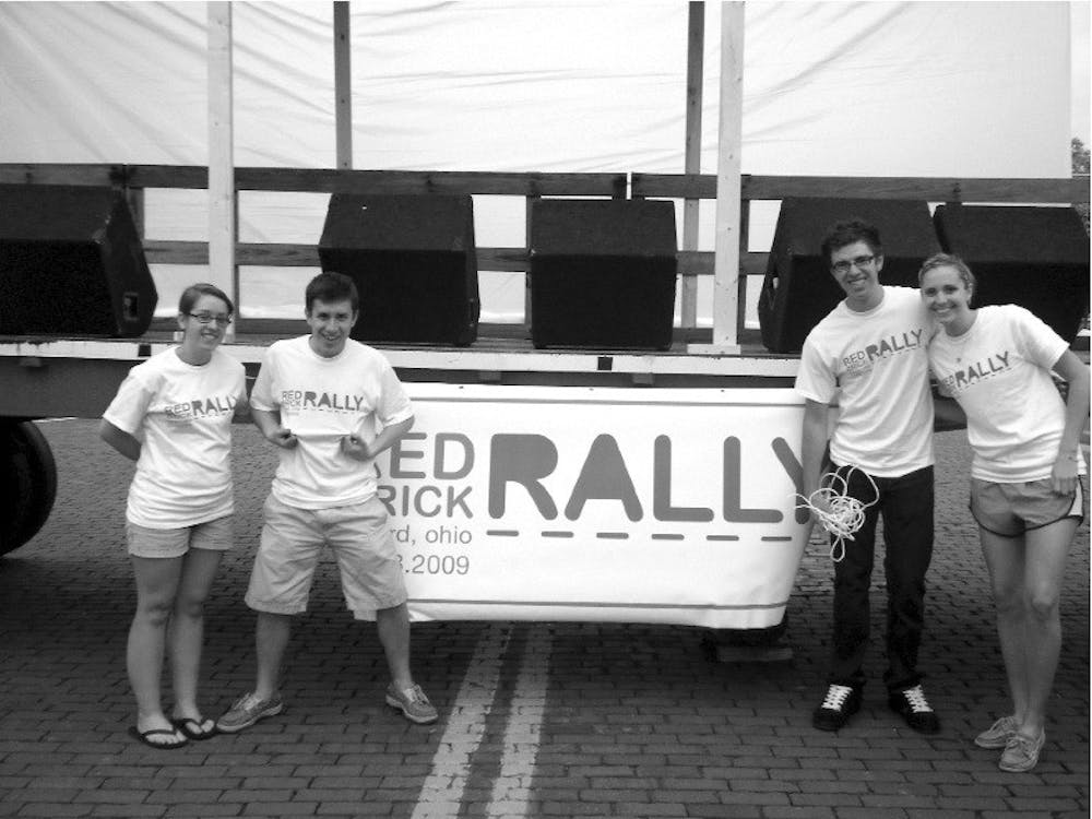 Miami students set up for Red Brick Rally 2009. The event brings in bands and closes down High Street for seniors to enjoy their last night in Oxford before graduating.
