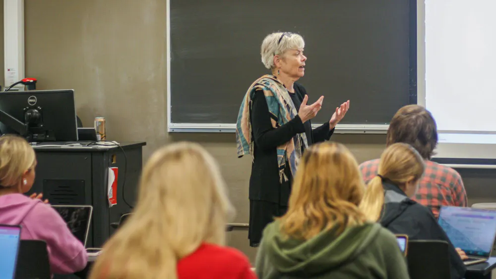 Mary Jean Corbett teaches students in room 249 of Upham Hall.