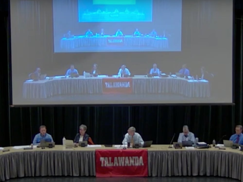 The Talawanda School District Board of Education voted to reinstate bussing, lower pay-to-play fees and hired two school counselors at its December meeting.