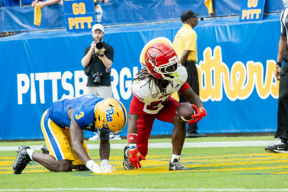Scoop kneels to stand after making it to the endzone