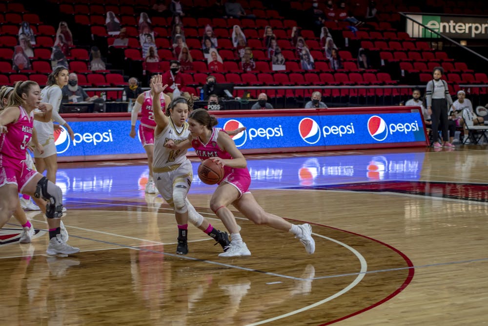 Katie Davidson (pictured) drives to the hoop in a Feb. 3, 2021 contest against Western Michigan.