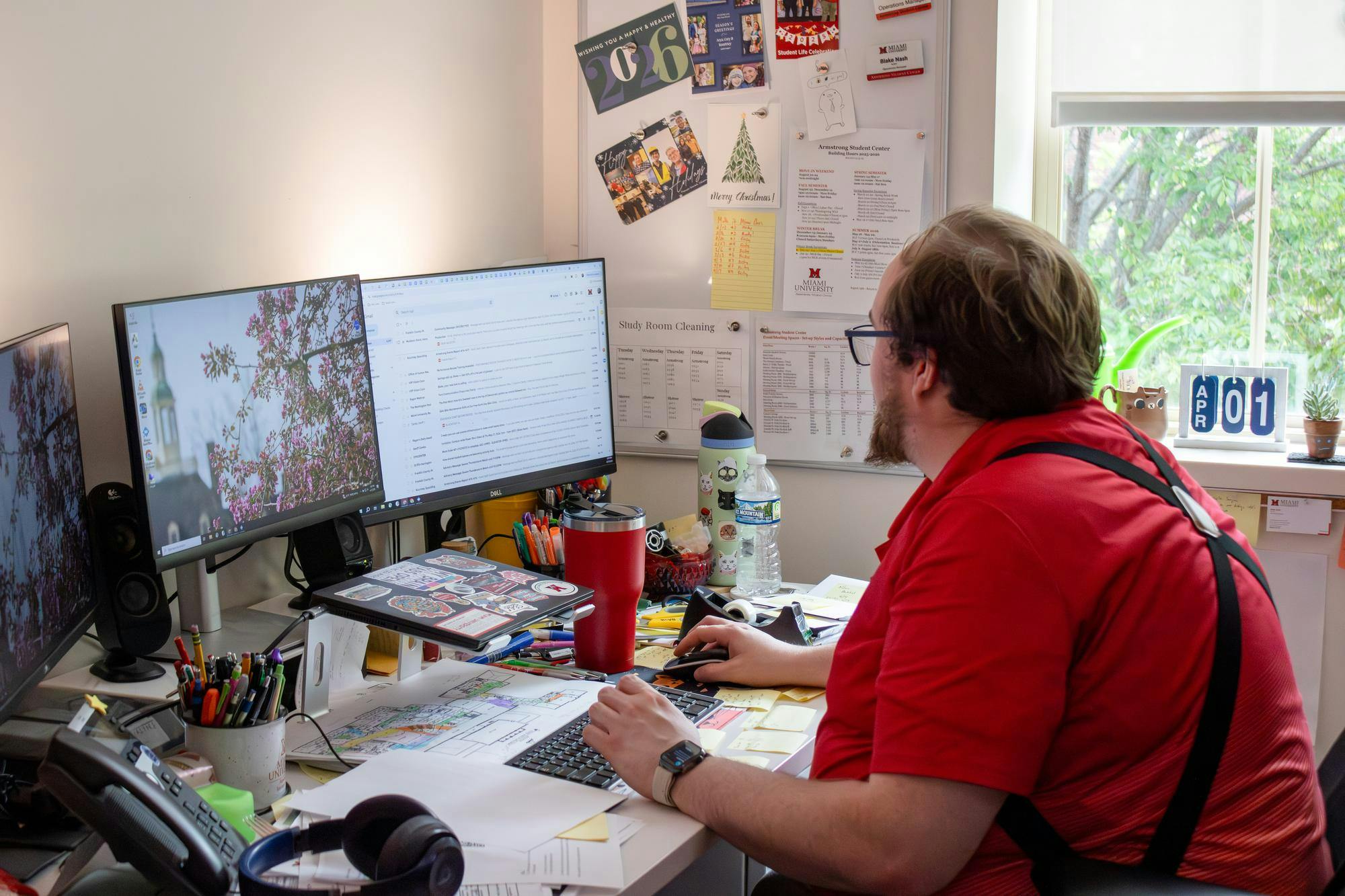 Armstrong Operations Manager Blake Nash works at his desk at 3015 Armstrong.