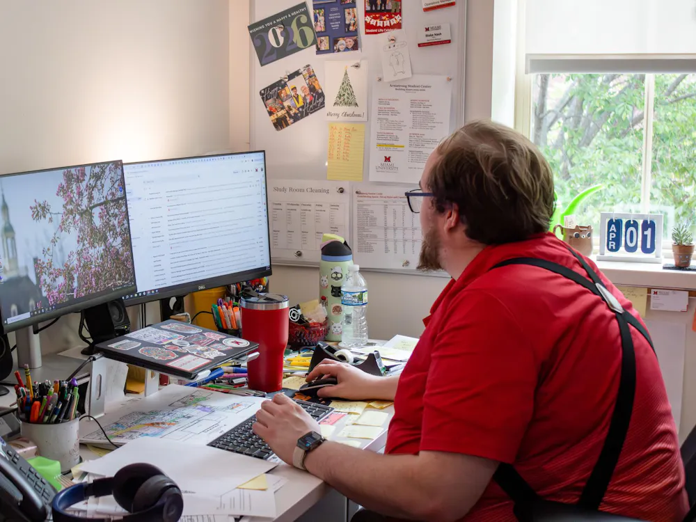 Armstrong Operations Manager Blake Nash works at his desk at 3015 Armstrong.