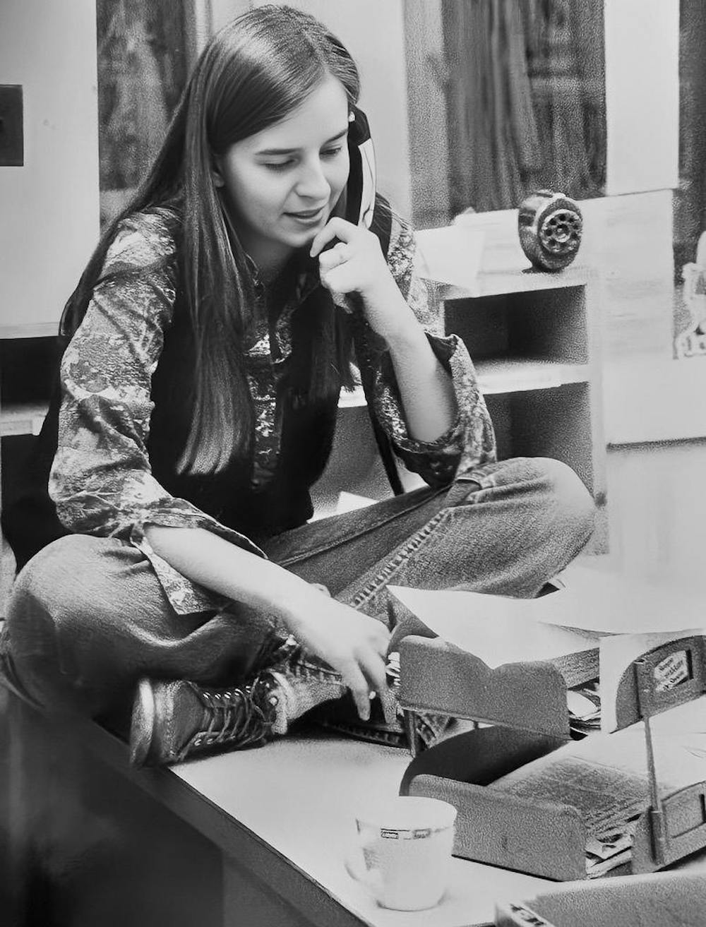 Sue MacDonald answers the phone in The Miami Student newsroom