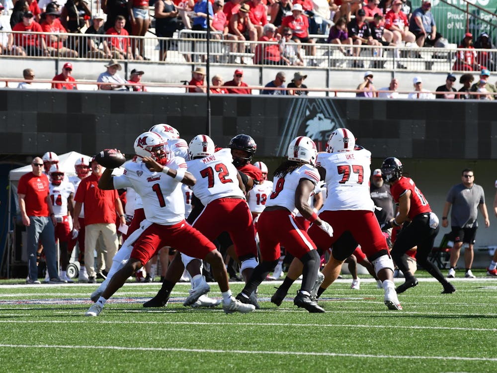 Dequan Finn looks to pass against Northern Illinois on Oct. 4