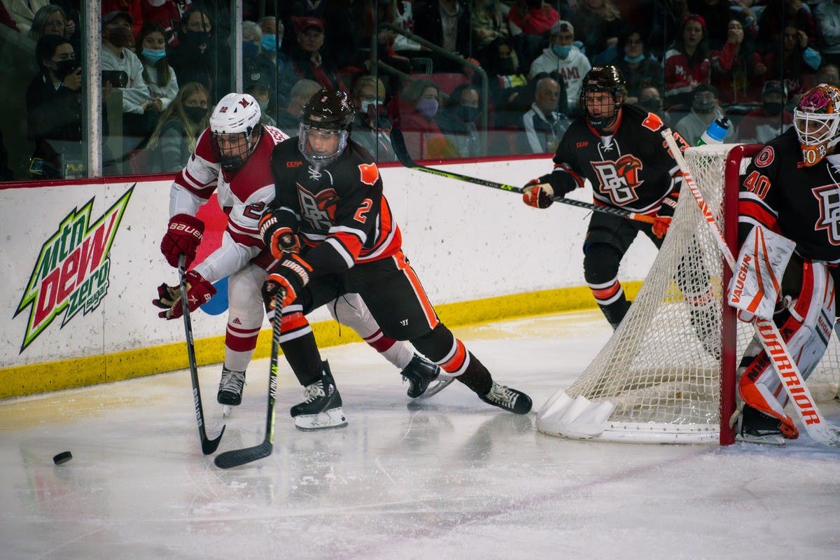 Junior forward Joe Cassetti reaches for the puck in Miami's 2-2 tie against Bowling Green.