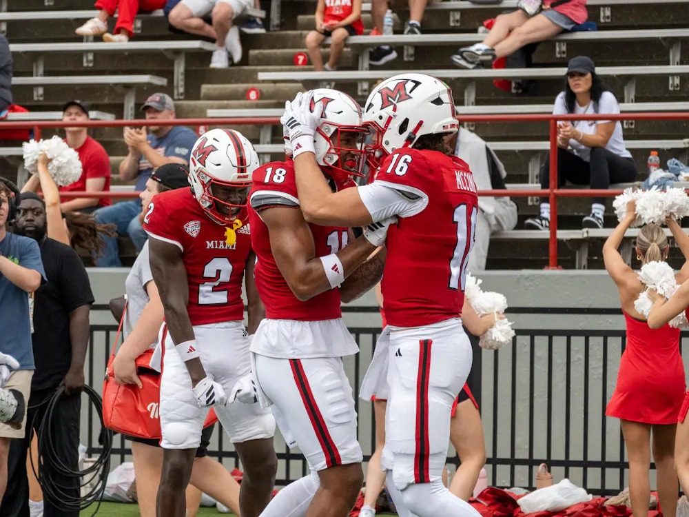 Quarterback David McComb and Wide Reciever Braylon Isom celebrate a touchdown in their game against Holy Cross on Sept. 12, 2026.