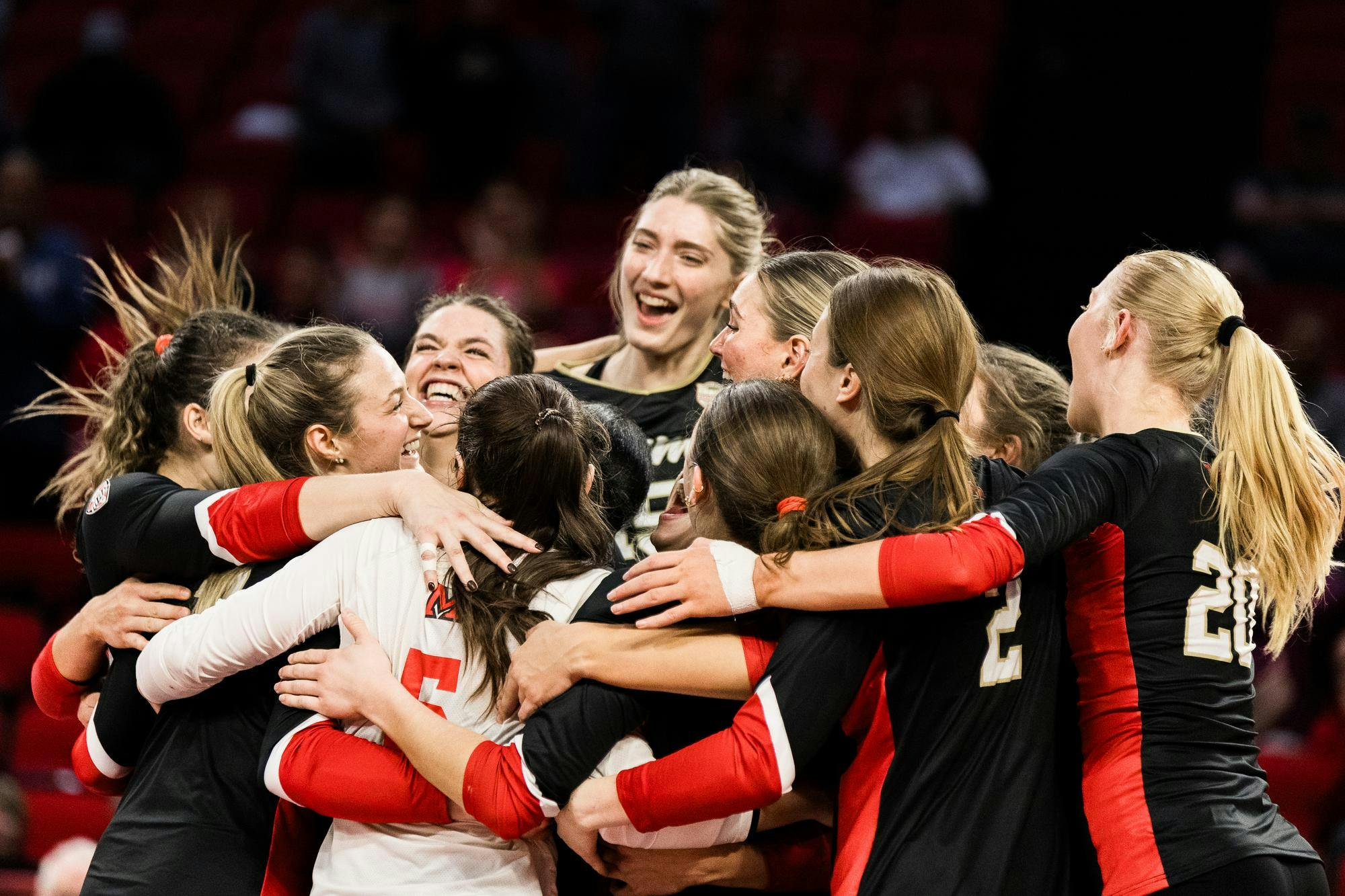 The Miami volleyball team celebrates its win over Eastern Michigan at Millett Hall on Nov. 14
