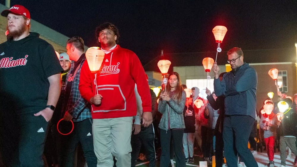 <p>Attendees walking and carrying lanterns at last year&#x27;s Light the Night﻿</p>