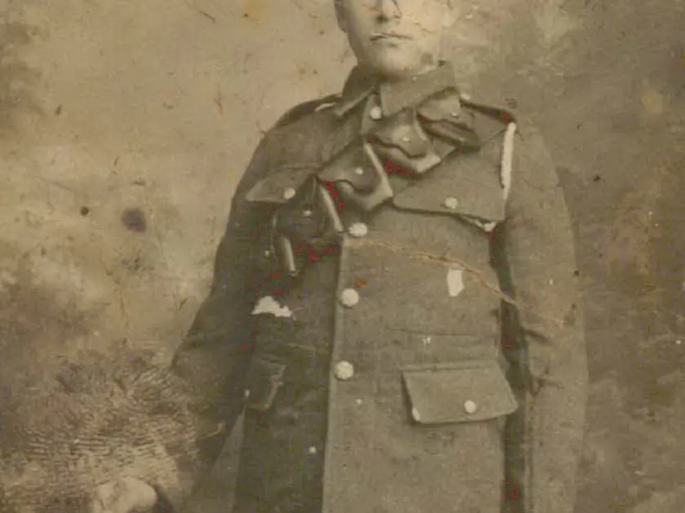 A photograph of William Stopani (1898-1918) in full officer uniform.