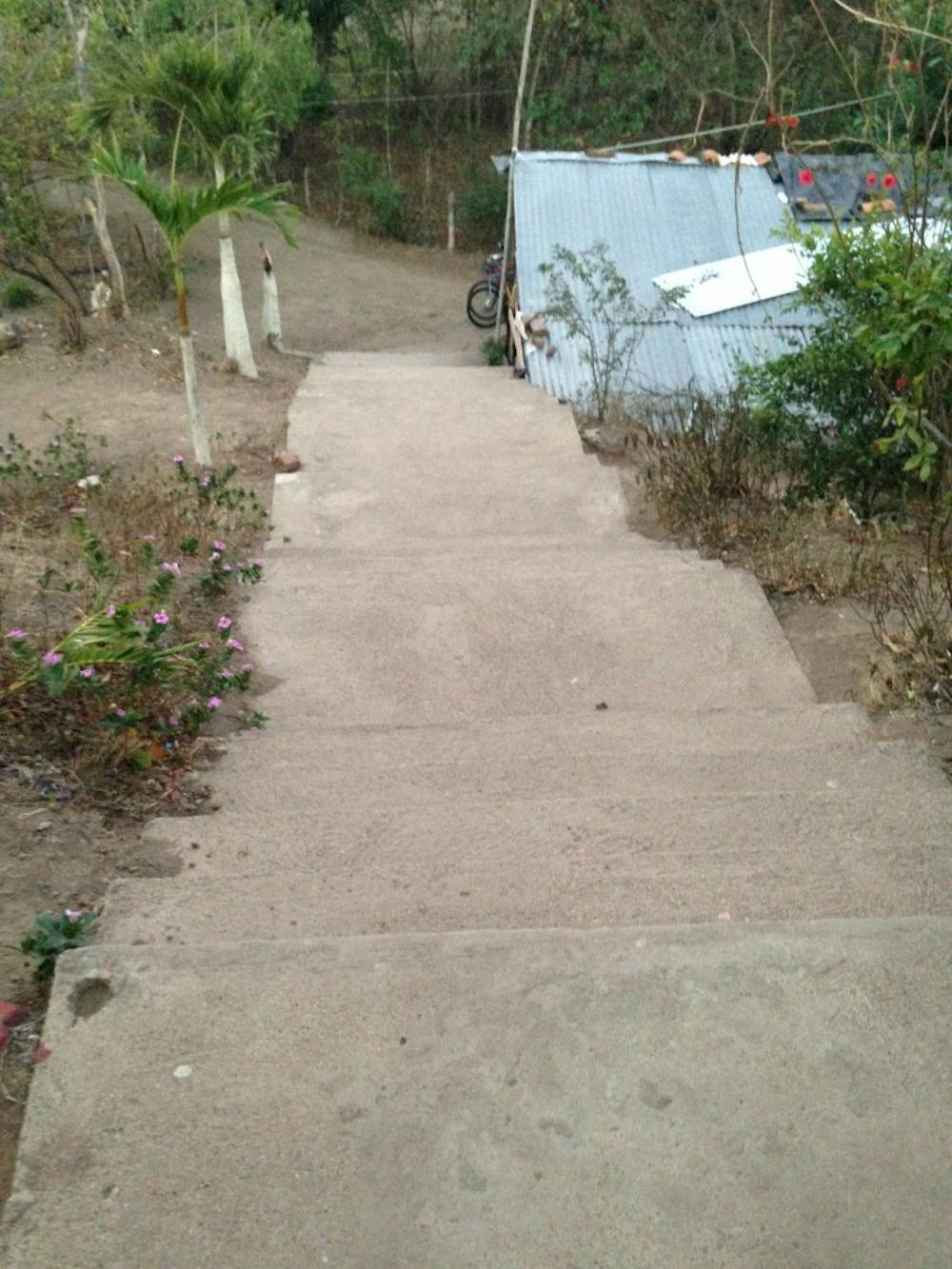 The view looking down the church steps to our host family's house.