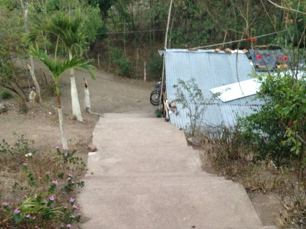 The view looking down the church steps to our host family's house.