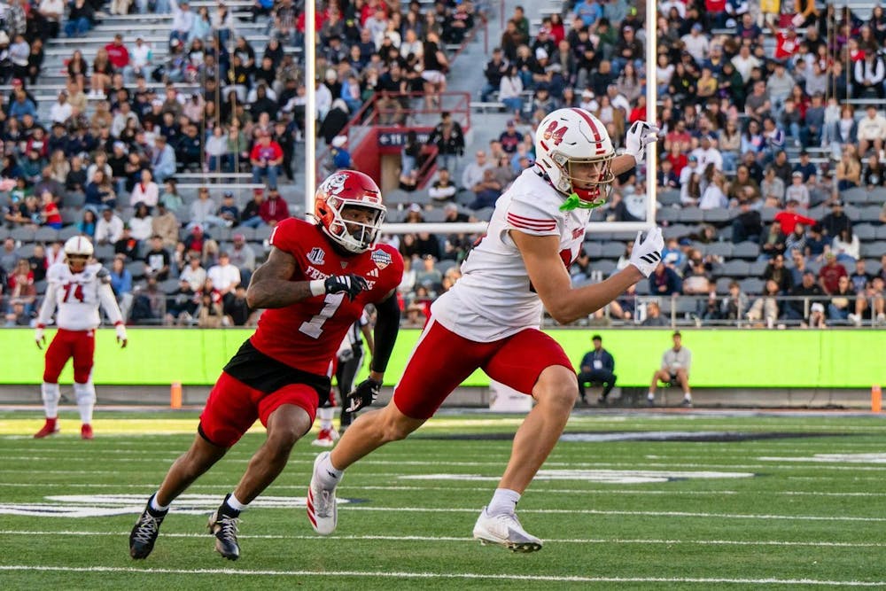 Redshirt sophomore receiver Cole Weaver runs away from a Fresno State defender at the Snoop Dogg Arizona Bowl in Tucson, Arizona, on Dec. 27, 2025