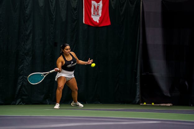 Freshman Nina Chavez hits a forehand in a match against Butler University.